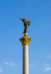 Fototapeta na wymiar Monument of Independence of Ukraine on blue sky background in Kiev