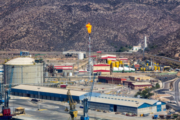 refinery with the chimney causing fire