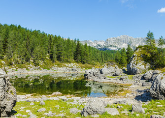 Fototapeta na wymiar Lake and mountains, beautiful landscape of Triglav national park in Slovenia, Europe.