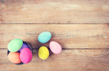 Vintage colorful easter eggs on wood table background