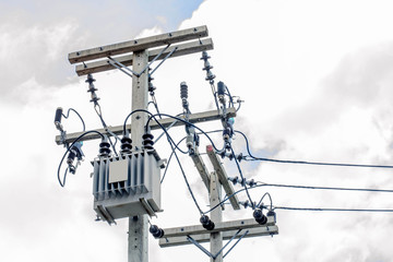 Obraz premium Transformer and power lines, selective focus point.