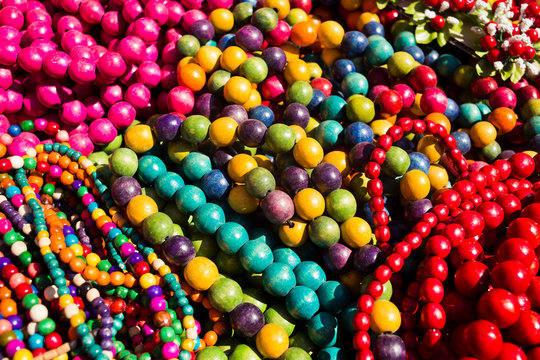 Colorful strings of semiprecious, wooden and glass bead