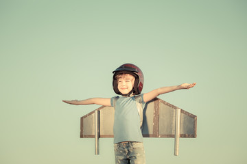 Happy child playing outdoors