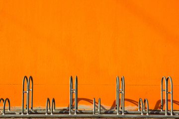 bicycle parking with orange background