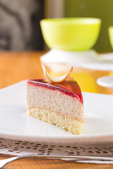 Slice of souffle cake with jam topping