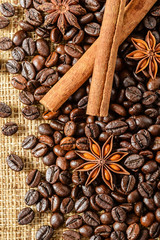 coffee beans and  cinnamon sticks, top view