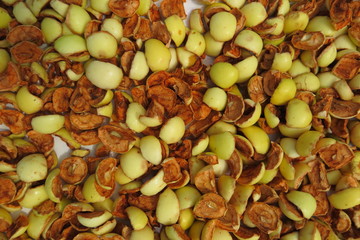 Sliced apples drying on a baking tray