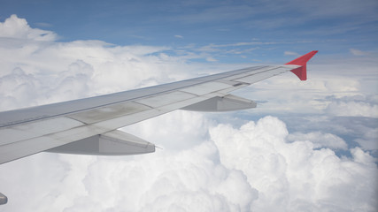 Fototapeta premium Wing view over blue sky