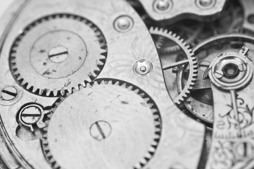 Black and white macro photo close-up view of metal clockwork