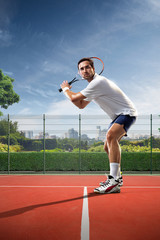 Young man is playing tennis