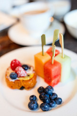 Breakfast with fresh fruits and coffee