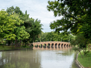 Fototapeta premium View of Park with Footbridge over the canal