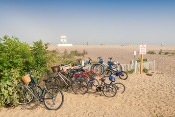 NANTUCKET, MA - JULY 13, 2008: Parked bicycles on the beach in s
