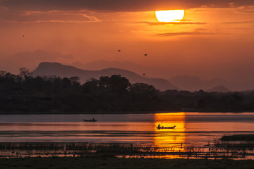 Fisherman in Arugam bay lagoon sunset, Sri Lanka