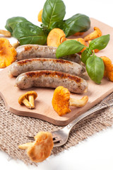 Grilled sausages with chanterelle