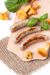 Grilled sausages with chanterelle