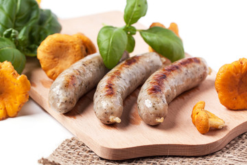 Grilled sausages with chanterelle