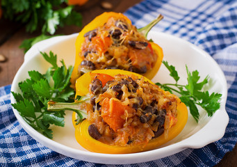 Stuffed peppers with rice, beans and pumpkin in the Mexican style