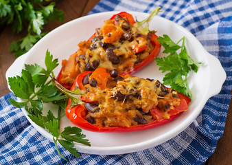 Stuffed peppers with rice, beans and pumpkin in the Mexican style