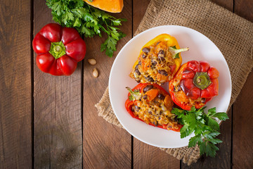 Stuffed peppers with rice, beans and pumpkin in the Mexican style. Top view