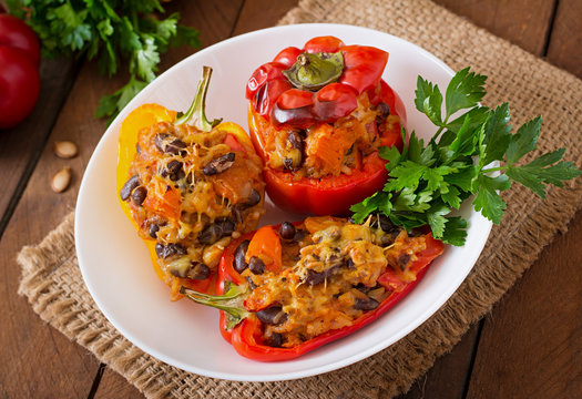 Stuffed peppers with rice, beans and pumpkin in the Mexican style