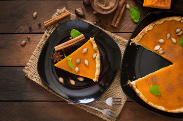 American pumpkin pie with cinnamon and nutmeg. Top view