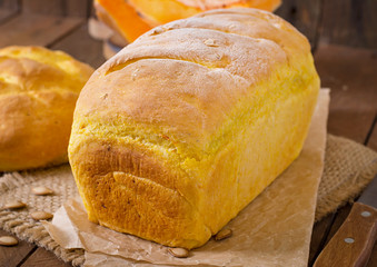 Fresh homemade pumpkin bread and pumpkin slices and olives
