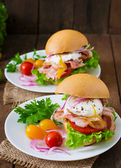 Sandwich with bacon and poached egg