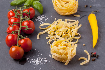 Dry pasta with tomatoes, basil and pepper