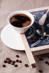 Chalkboard with cup of coffee