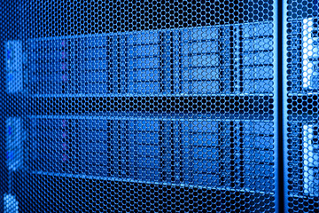 computer server in rack with blue light close up