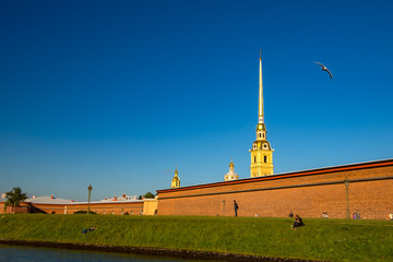 People are relaxing near Peter and Paul Cathedral