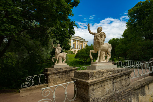 Bridge with Satirs. View on Palace in Pavlovsk park
