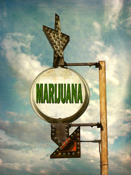 aged and worn vintage photo of marijuana sign