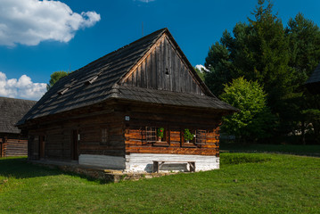Fototapeta na wymiar Wooden cottage from Nolcovo, Turiec - Museum of the Slovak Village, Martin, Slovakia