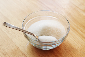 Fototapeta na wymiar Sugar in glass bowl 