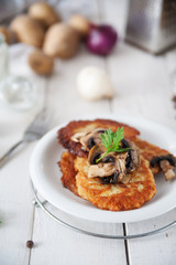 Crunchy potato pancakes with mushrooms