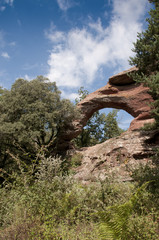 La roca foradada de Prades
Stone Bridge red made by natural erosion of the stone from the mountains of Montsant, Prades, Catalonia, Spain