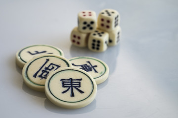 Mahjong-dice and coins