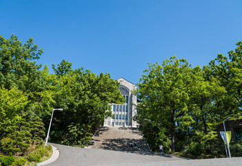 Old beautiful church with stone stair and blue sky