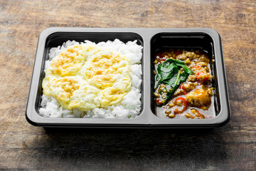 Stir Fried Chicken with Basil over Rice and Minced Pork Omelette