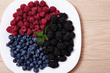 Juicy ripe natural organic raspberries blueberries blackberries