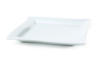 Empty white plate isolated on white