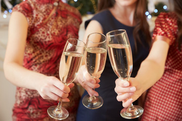 three glasses of champagne close-up women at a party