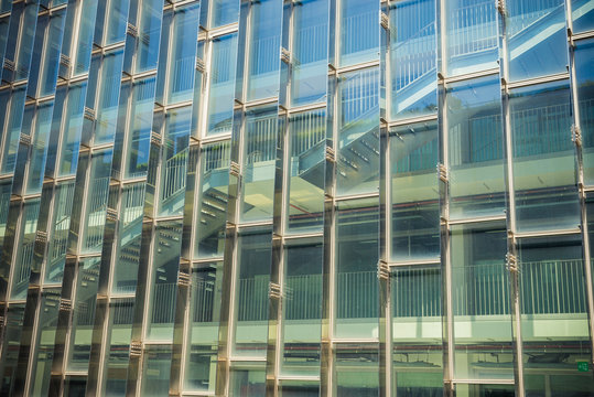 Building and reflect building on glass wall