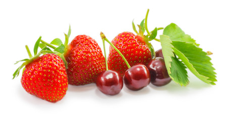 strawberries and cherries isolated on a white background