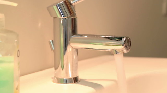 Close up of a running faucet