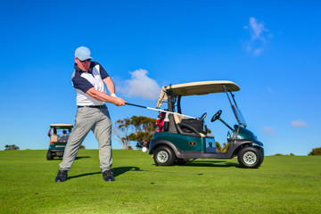 Golf player on the golf field. Cape Kidnappers golf court. New Zealand.