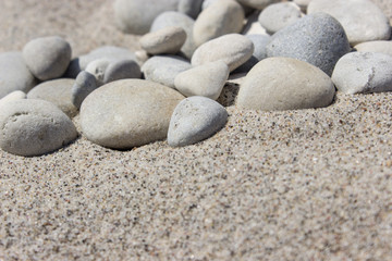 Fototapeta na wymiar beach / Pebbles in the sand 