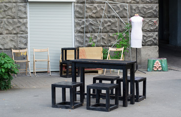 table and chairs on the street